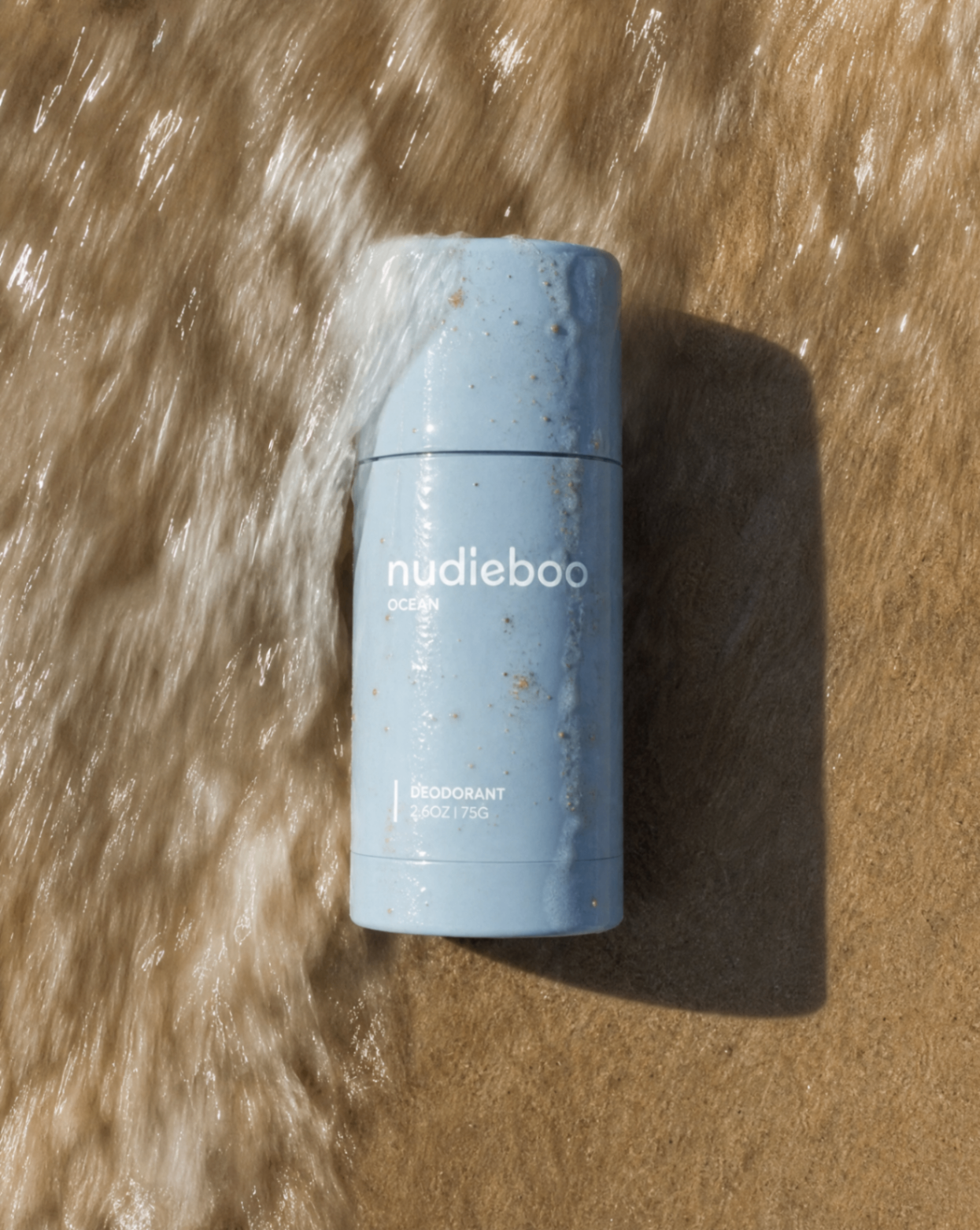 Ocean deodorant on wet sand